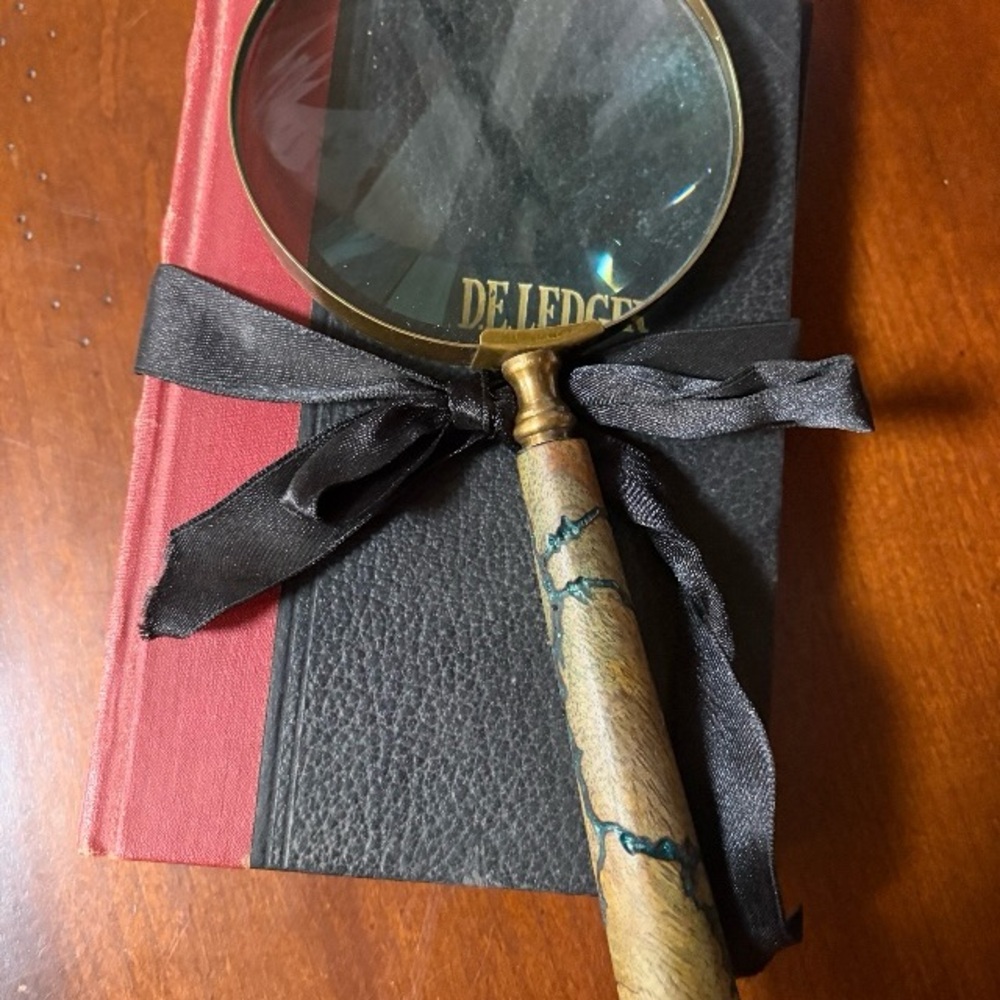 Vintage Style Magnifying Glass with black ribbon.